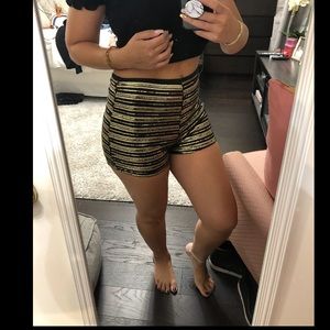 Gold and black sequin shorts